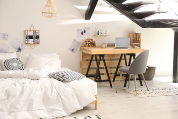 Sticker - Elegant interior of bedroom with workplace under stairs