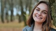 © Довидович Михаил - Beautiful happy smiling young girl in autumn park.
