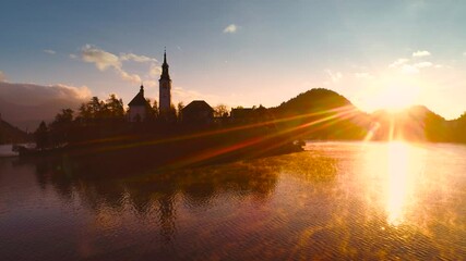 Wall Mural - Lake Bled, Sloveniа, Aerial spectacular sunset view over church of Assumption.