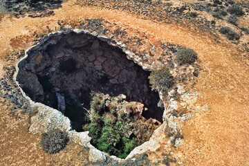 Canvas Print - Huge sinkhole leading to the underground cave