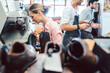© Kzenon - Shoes waiting to be repaired in workshop of cobbler