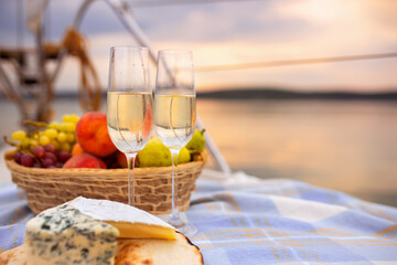 Wall Mural - picnic on a yacht at sunset