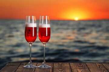 Wall Mural - two glasses of red champagne