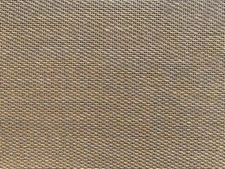 ิbrown cream speaker grill look Like woven bamboo can use for background, backdrop and texture with copy space for letter. concept for instrumental.