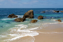 Seascape Of Ocean, Beach And Offshore Rocks In The Shallows At Woods Cove, In Laguna Beach, California.