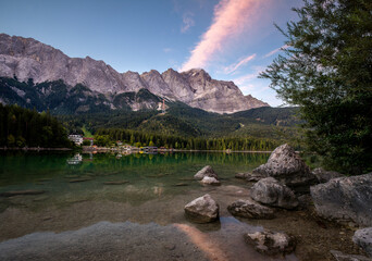 Wall Mural - Beautiful Eibsee mountain lake reflections during sunrise