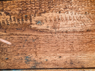 Closeup on old damaged wooden boards wall texture