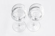 © MM - Two glasses on a white background.