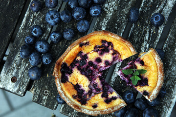 Wall Mural - Blueberry pie or homemade cheesecake with blueberries. Delicous dessert blueberry tart