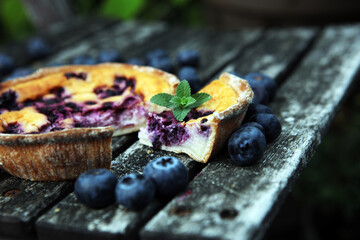 Wall Mural - Blueberry pie or homemade cheesecake with blueberries. Delicous dessert blueberry tart