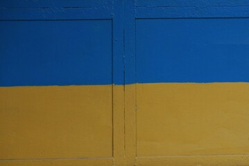 Wall Mural - blue yellow metal texture from old iron wall with seam