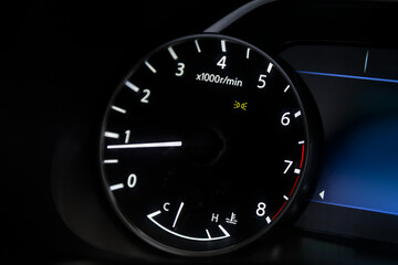 Wall Mural - dashboard of the car is illuminated by bright  circle tachometer.