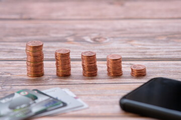 Stacks of gold money coin on black background and concept saving money 