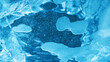 The abstract background of ice structure. Frozen blue wall