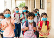 © Tom Wang - children wearing  face medical mask back to school after covid-19 quarantine