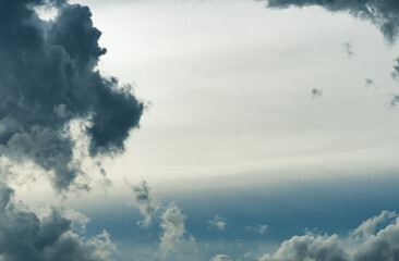 Wall Mural - dark dramatic sky and clouds. background frame for death and sad concept. gray sky and white clouds.