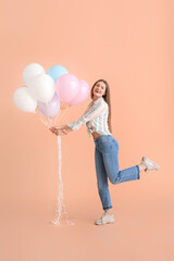 Sticker - Young woman with balloons on color background