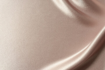 Luxury smooth elegant rose golden silk fabric texture as background