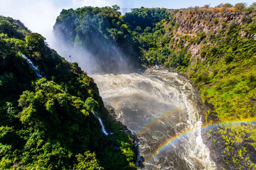 Canvas Print - Huge rainbow in the water mist