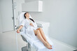 © Viacheslav Yakobchuk - Serene dark-haired woman getting an intravenous vitamin treatment