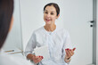 © Viacheslav Yakobchuk - Friendly Caucasian woman dermatologist consulting her patient