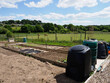 a new allotment under construction showing early planting