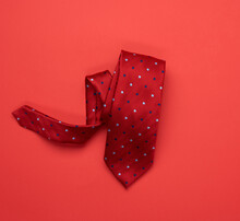 Twisted Silk Red Tie On Red Background