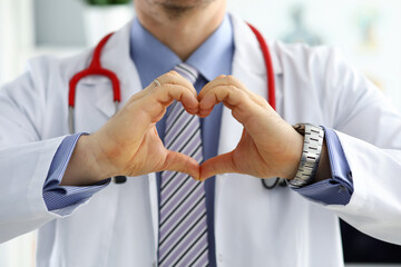 Sticker - Male medicine doctor hands showing heart shape