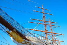 Tall Masts And Yards Of A White Classic Sailing Vessel.