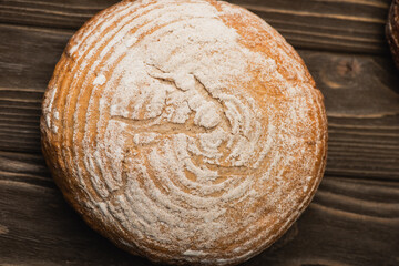 Sticker - top view of fresh baked white bread loaf on wooden surface