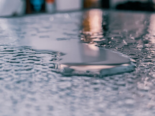 Canvas Print - Closeup shot of water pouring on a surface