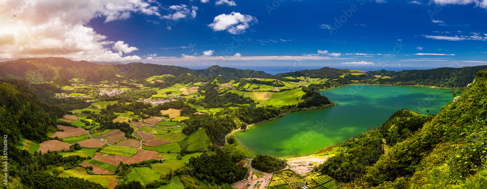 Aerial view of Lagoa das Furnas located on the Azorean island of Sao Miguel, Azores, Portugal. Lake Furnas (Lagoa das Furnas) on Sao Miguel, Azores, Portugal from the Pico do Ferro scenic viewpoint. - obrazy, fototapety, plakaty 