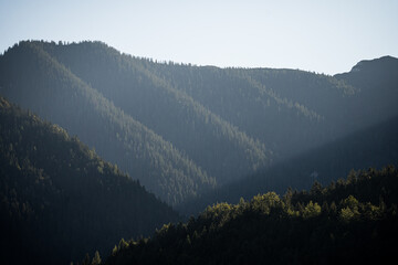 Wall Mural - view on the karwendel mountains and first sun rays in the early morning in the alpine town of Mittenwald