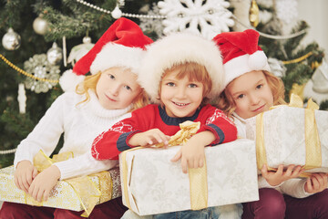 three children with gifts