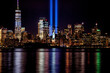 9/11 Memorial Beams with Statue of Liberty and Lower Manhattan.