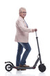 © ASDF - side view. modern elderly woman with electric scooter