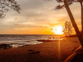 Wall Mural - Ultimate experience, travel, rest and amazing sunset on Phu Quoc island . View sundown on the sea of Phu Quoc island, Vietnam