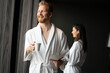 © NDABCREATIVITY - Young handsome man drinking morning coffee in bathrobe