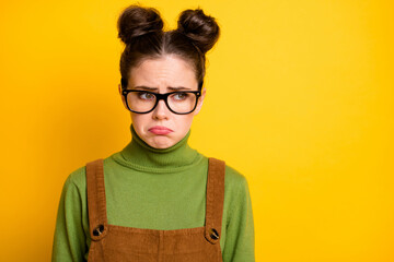 Poster - Photo of sad offended lady two funny buns geek nerd student failed examination crying unhappy tears grimacing wear specs green pullover brown overall isolated yellow color background