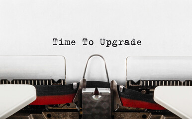 Wall Mural - text time to upgrade typed on typewriter