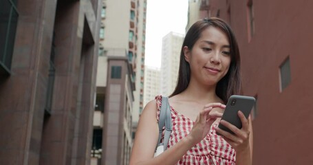 Poster - Woman hold with cellphone in city