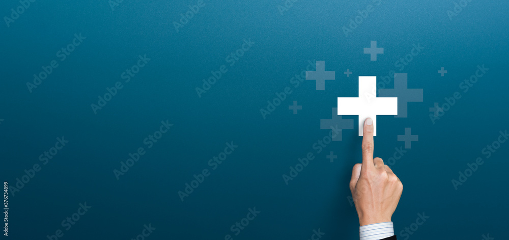 Businessman pushing button positive thing. Business for Profit, Benefit, health insurance, Development and growth concepts. Represented by a plus sign with copy space - obrazy, fototapety, plakaty 