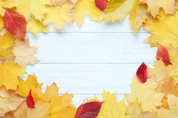 Wall Mural - Autumn leafs on white wooden table