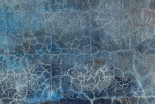 Abstract Blue Background. Cracks. The Texture Of The Old Surface. Cracks In The Old Plaster. Old Texture. Grunge Texture. Blue Grunge Background.