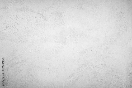 White painted concrete wall as a background or texture © John Smith