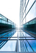 © alessio - Glass building skyscraping the the sky