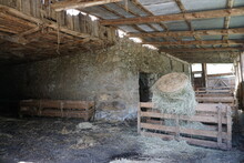 Old Stone Farm House With Hay Bale For Sheeps