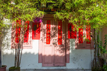 Building With Pink And Red Window Shutters, Malacca, Malaysia