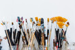 © Connect Images - Still life of glass jars containing paintbrushes