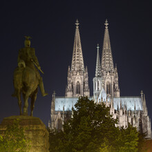 Kaiser Wilhelm II Statue And Cologne Cathedral (Koelner Dom) At Night, Cologne, Germany